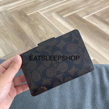 Load image into Gallery viewer, COACH MEDIUM CORNER ZIP WALLET SIGNATURE CANVAS IM/WALNUT/BLACK CW786