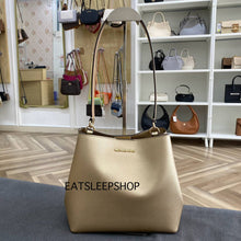 Load image into Gallery viewer, MICHAEL KORS PRATT MEDIUM BUCKET IN PALE GOLD