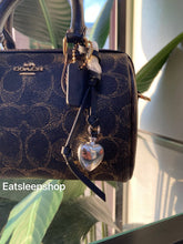 Load image into Gallery viewer, COACH MINI ROWAN CROSSBODY BAG IN LOVED SIGNATURE CANVAS (CDY29 IMBRN) WITH CHARMS IN BROWN