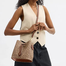 Load image into Gallery viewer, COACH ROWAN BUCKET CBH06 IN TAN BROWN