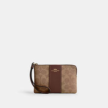 Load image into Gallery viewer, CORNER CORNER ZIP WRISTLET IN SIGNATURE CANVAS WITH STRIPE (COACH CW854) GOLD/TAN/BROWN