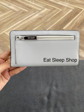 Load image into Gallery viewer, KATE SPADE LARGE SLIM BIFOLD WALLET MADISON IN PLATINUM (020)