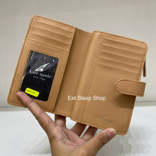 Load image into Gallery viewer, KATE SPADE CAREY MEDIUM COMPACT BIFOLD WALLET IN TIRAMISU (MINOR DENTS AND SCRATCHES)