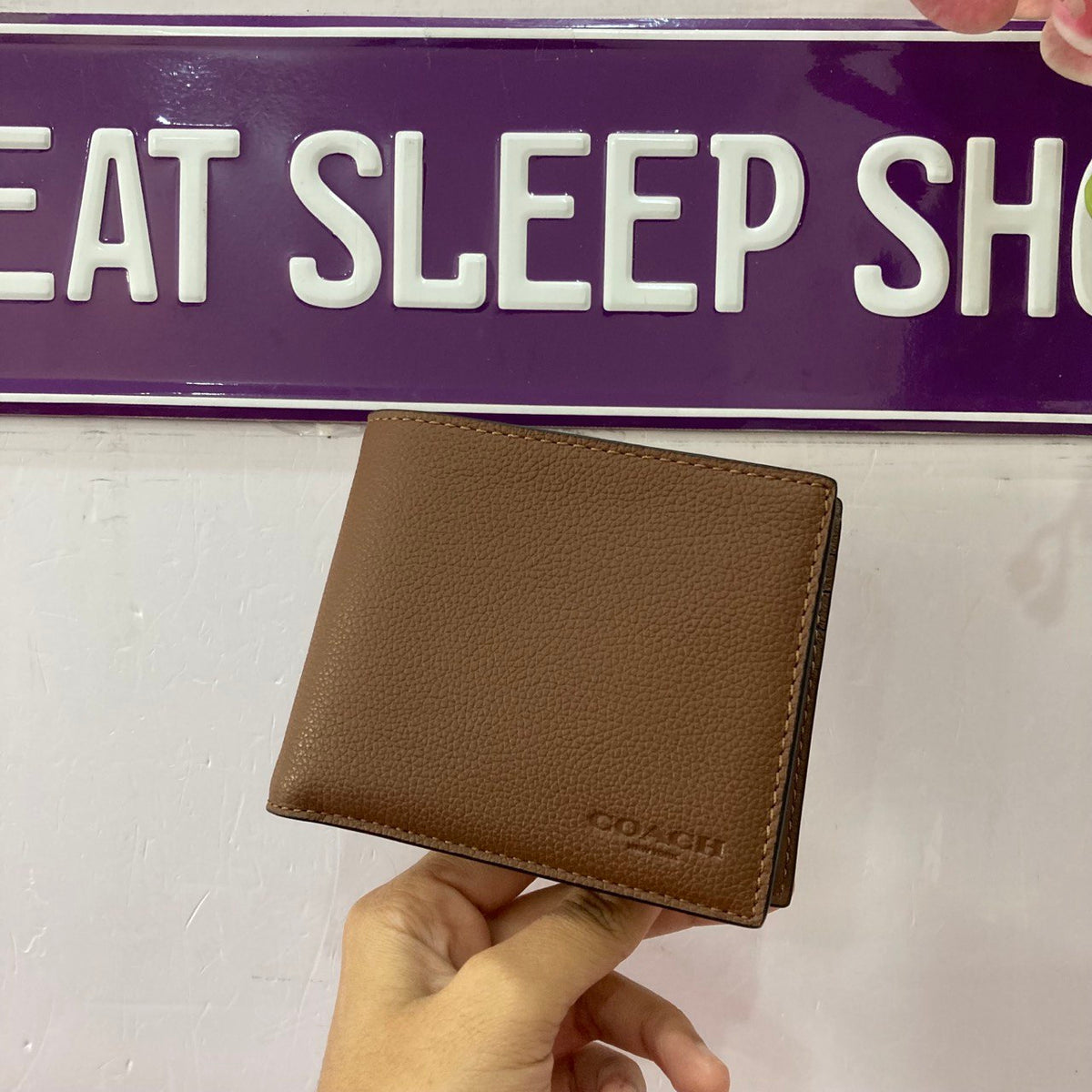 Coach dark saddle wallet sale