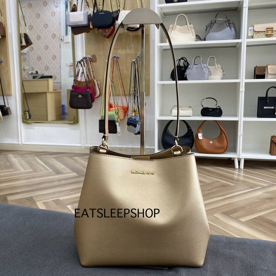 MICHAEL KORS PRATT MEDIUM BUCKET IN PALE GOLD