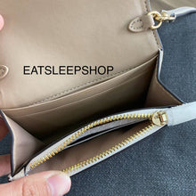 Load image into Gallery viewer, COACH MINI ENVELOPE WALLET WITH STRAP IN SIGNATURE CANVAS CU172 GOLD/LIGHT KHAKI CHALK
