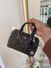 Load image into Gallery viewer, COACH MINI ROWAN CROSSBODY BAG IN LOVED SIGNATURE CANVAS (CDY29 IMBRN) WITH CHARMS IN BROWN
