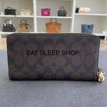 Load image into Gallery viewer, COACH SIGNATURE LONG ZIP AROUND WALLET C4452 IN BROWN BLACK
