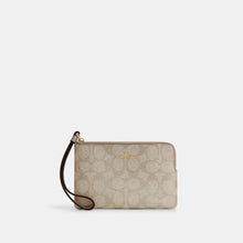 Load image into Gallery viewer, COACH CORNER ZIP WRISTLET IN SIGNATURE CANVAS (COACH CW964) GOLD/CHAMPAGNE MULTI
