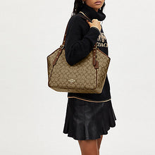 Load image into Gallery viewer, COACH MEADOW SHOULDER BAG IN KHAKI SADDLE
