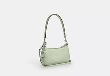 Load image into Gallery viewer, COACH TERI MINI CROSSBODY IN SIGNATURE LEATHGER WITH HEART CHARM IN PALE GREEN
