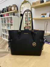 Load image into Gallery viewer, MICHAEL KORS GILLY LARGE DRAWSTRING TRAVEL TOTE SAFFIANO LEATHER IN BLACK

