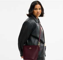 Load image into Gallery viewer, COACH LOGAN DUFFLE CROSSGRAIN LEATHER IN DARK WINE
