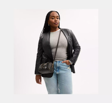 Load image into Gallery viewer, COACH MINI ROWAN CROSSBODY BAG IN LOVED SIGNATURE CANVAS (CDY29 IMBRN) WITH CHARMS IN BROWN
