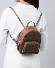 Load image into Gallery viewer, MICHAEL KORS JAYCEE XS CONVERTIBLE ZIP POCKET BACKPACK IN SIGNATURE BROWN
