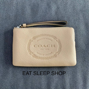 COACH LARGE CORNER ZIP WRISTLET WITH COACH HERITAGE IN TAUPE CM242