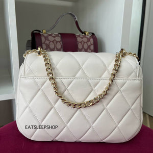KATE SPADE CAREY SMOOTH QUILTED LEATHER SMALL  IN PARCHMENT