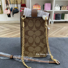 Load image into Gallery viewer, COACH PHONE CROSSBODY IN SIGNATURE CANVAS C7397 GOLD/KHAKI SADDLE
