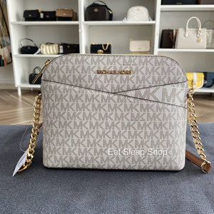 MICHAEL KORS MEDIUM DOME XCROSS CROSSBODY SIGNATURE IN VANILLA