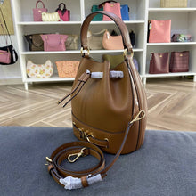 Load image into Gallery viewer, MICHAEL KORS REED MEDIUM BELT BUCKET MESSENGER IN LEATHER LUGGAGE
