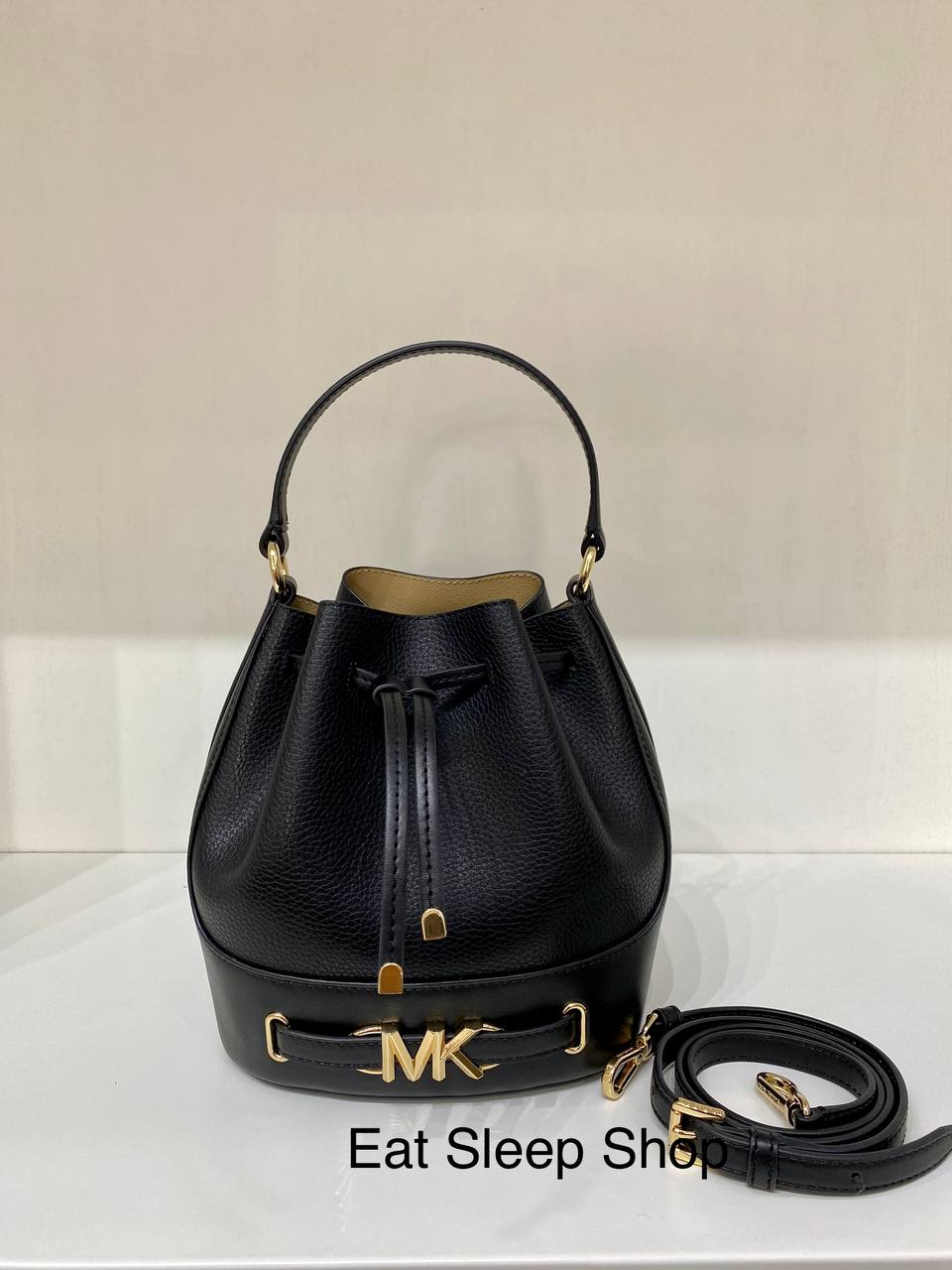 Mk bucket hotsell sling bag