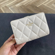 KATE SPADE CAREY MEDIUM COMPACT BIFOLD WALLET IN PARCHMENT (MINOR DENTS AND SCRATCHES)