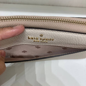 KATE SPADE LEILA LARGE CONTINENTAL WALLET IN LIGHT SAND