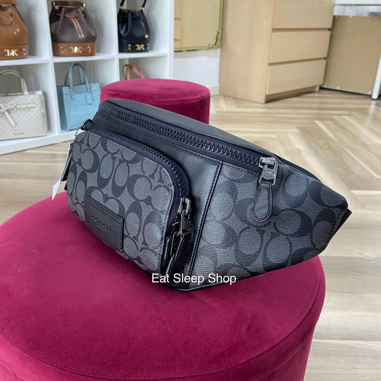 Black fabric store coach purse