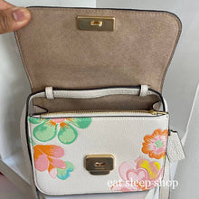 Load image into Gallery viewer, COACH MINI BRYNN CROSSBODY C8324 WITH DREAMY LAND FLORAL PRINT IN GOLD/CHALK MULTI
