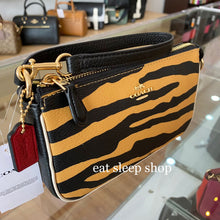 Load image into Gallery viewer, COACH NOLITA 19 WRISTLET SIGNATURE CANVAS WITH TIGER C7438 IN IM/HONEY/BLACK MULTI
