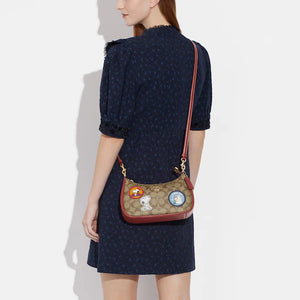 COACH X PEANUTS TERI SHOULDER BAG IN SIGNATURE CANVAS WITH PATCHES E848 IN GOLD/KHAKI/REDWOOD MULTI