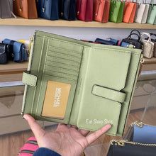 Load image into Gallery viewer, MICHAEL KORS JET SET TRAVEL LARGE DOUBLE ZIP WRISTLET WALLET LEATHER IN LIGHT SAGE
