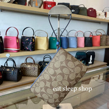 Load image into Gallery viewer, COACH LARGE CORNER ZIP WRISTLET SIGNATURE CANVAS 6648 IN SV/KHAKI/STONE BLUE
