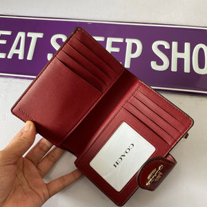 COACH MEDIUM CORNER ZIP WALLET SIGNATURE CANVAS C0082 IN BROWN 1941 RED