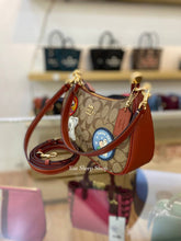 Load image into Gallery viewer, COACH X PEANUTS TERI SHOULDER BAG IN SIGNATURE CANVAS WITH PATCHES E848 IN GOLD/KHAKI/REDWOOD MULTI
